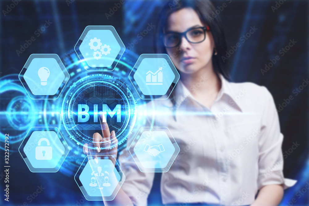 Business, Technology, Internet and network concept. Young businessman working on a virtual screen of the future and sees the inscription: BIM Business, Technology, Internet and network concept. Young businessman working on a virtual screen of the future and sees the inscription: BIM
