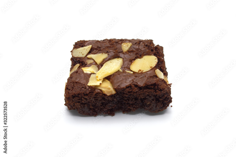 Single of Chocolate brownie with sliced almond nuts toppings isolated on white background. Single of Chocolate brownie with sliced almond nuts toppings isolated on white background.