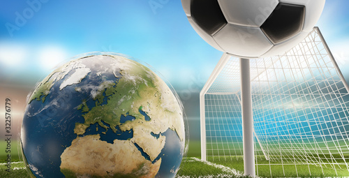 globe and soccer ball and g...