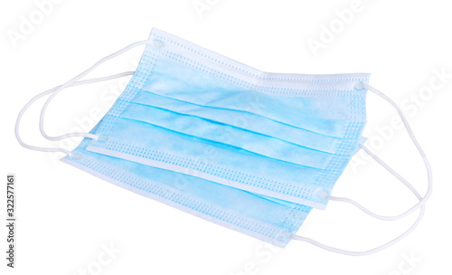Two blue disposable face masks (with clipping path) isolated on white background. Protective surgical Ear-Loop Masks