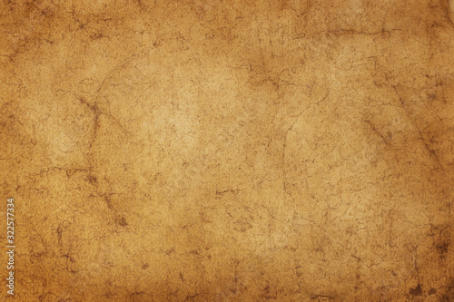 Flat lay the ancient old vintage surface of paper or parchment. Abstract trendy vintage grunge texture background