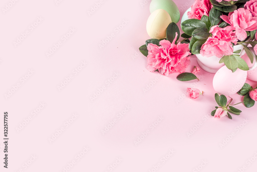 Tender Easter composition with easter eggs and pink spring flower branches