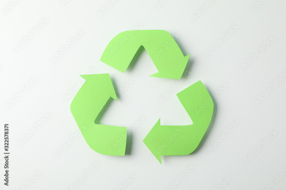Recycling sign on white background, top view Recycling sign on white background, top view
