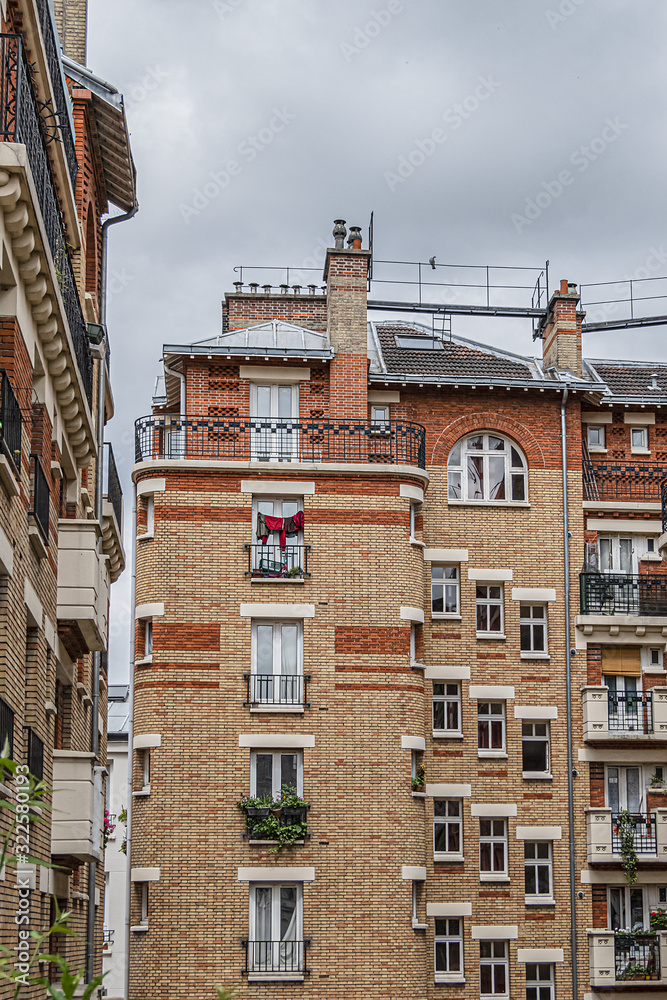 Beautiful architecture of residential buildings on the street of Abel (Rue Abel) - 260 meters long street in the 12 arrondissement of Paris in the quartier Quinze-Vingts. Paris, France.