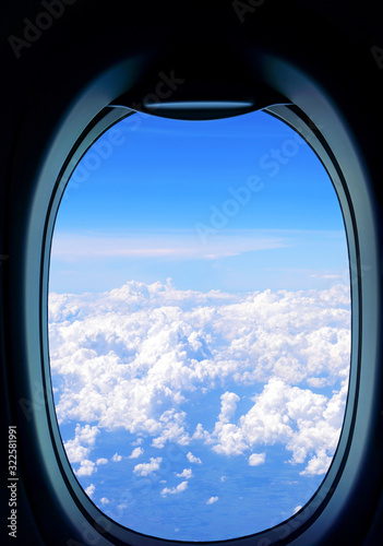 The airplane window is travelling on sky