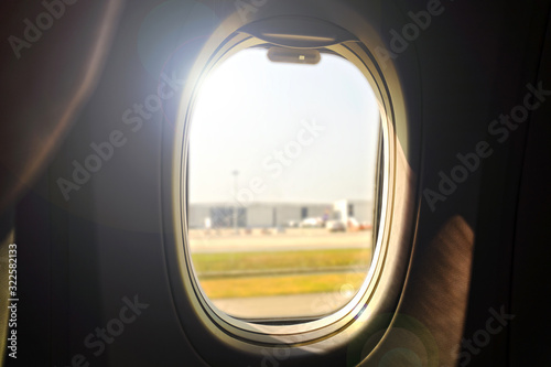 The airplane window is travelling 