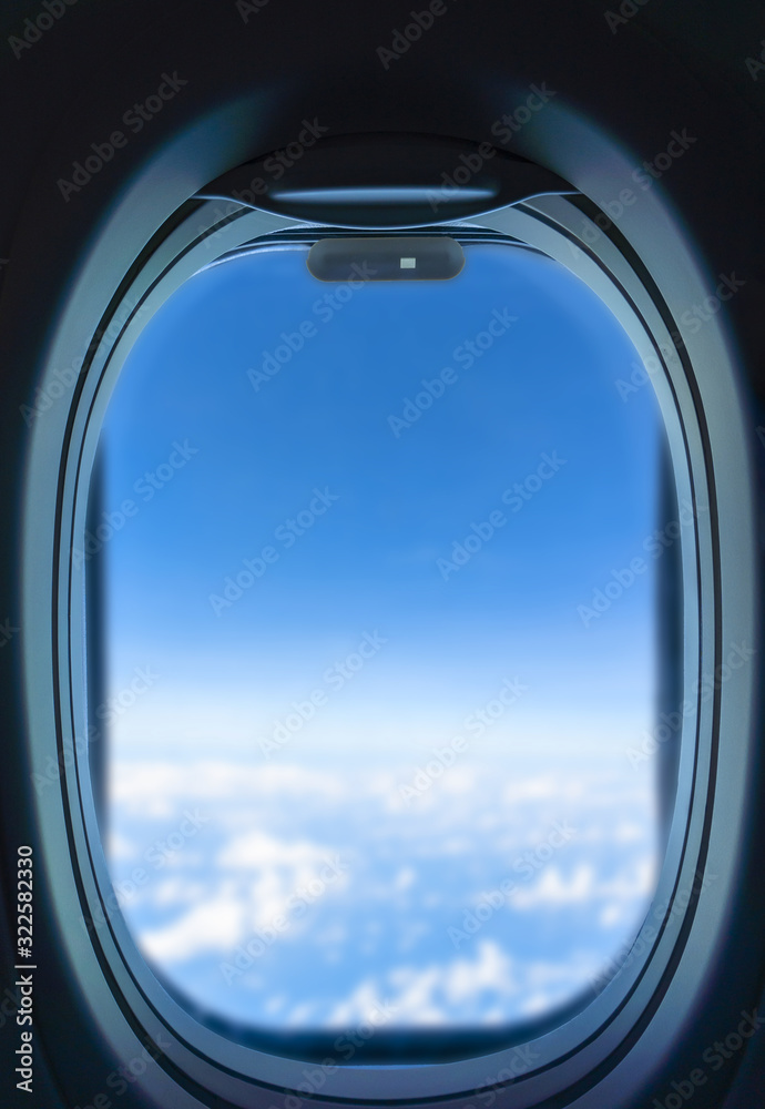 The airplane window is travelling on sky