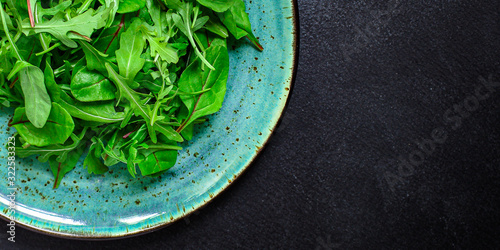 Healthy salad, leaves mix salad (mix micro green, juicy snack). food background, Top imsge  photo