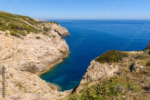 Rocky coast with blue sea. North-east coast of Majorca. Spain