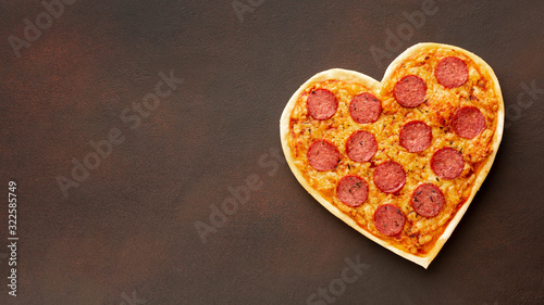Heart shaped pizza with copy space