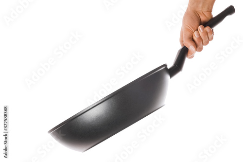 a pan in hands on a white background photo