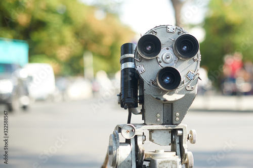 Vintage theodolite or camera with three lenses