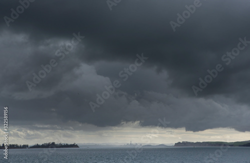 Auckland New Zealand. Dark clouds. Ferry to the city from Waiheke island