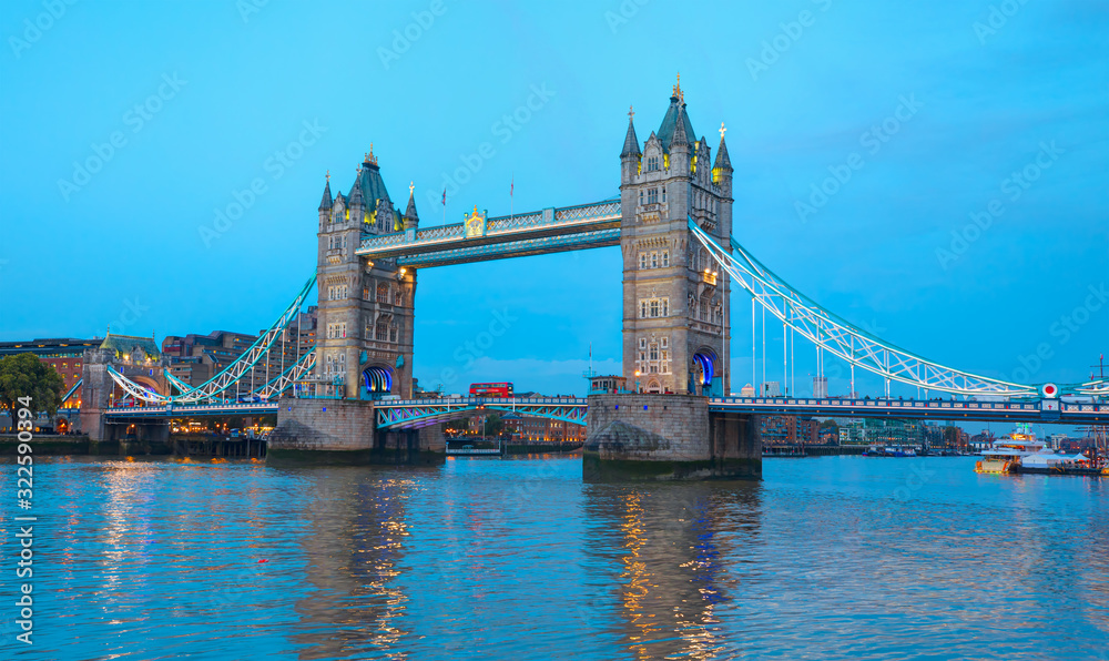 Panorama of the Tower Bridge and Tower of London on Thames river at twilight blue hour - London, United Kingdom