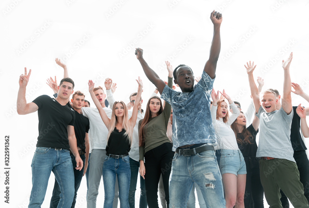 large group of diverse young people showing their success. large group of diverse young people showing their success.