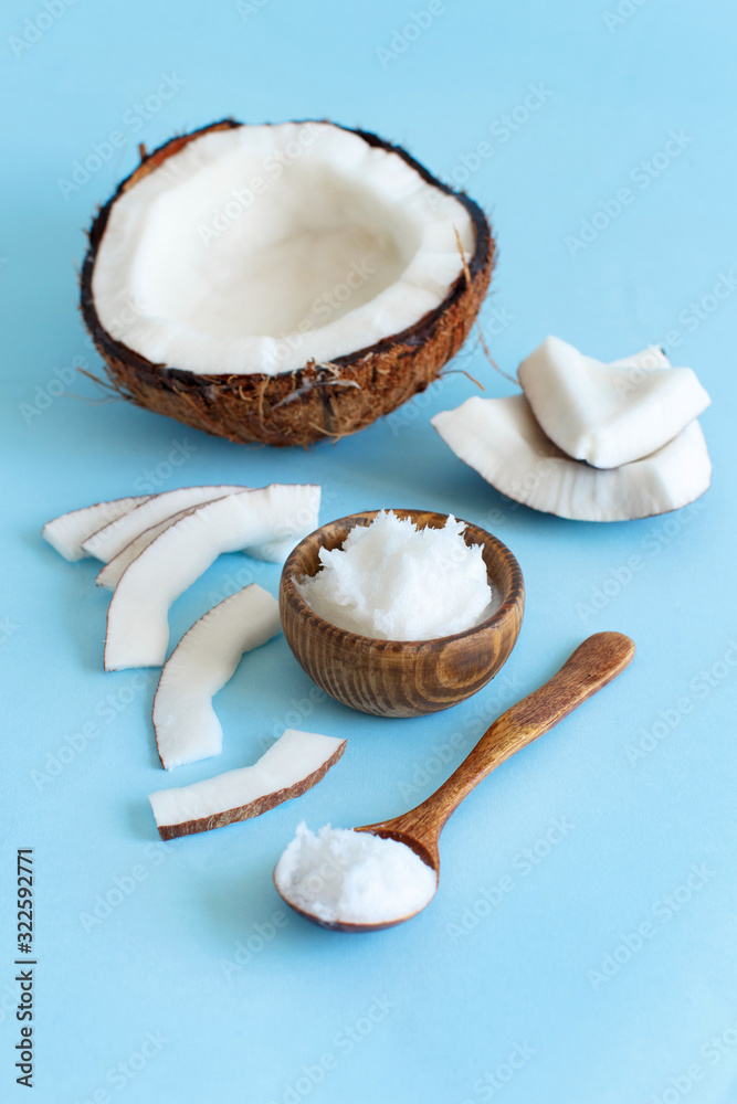 Coconut oil in a bowl with a spoon Coconut oil in a bowl with a spoon