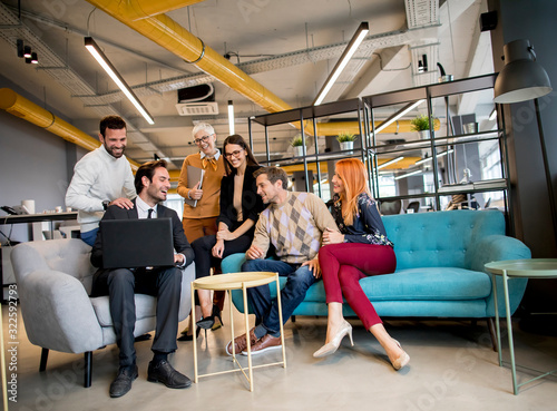 Smiling diverse businesspeople talking in an office