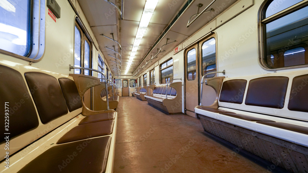 The interior of the old passenger train car of the Moscow subway, Russia.