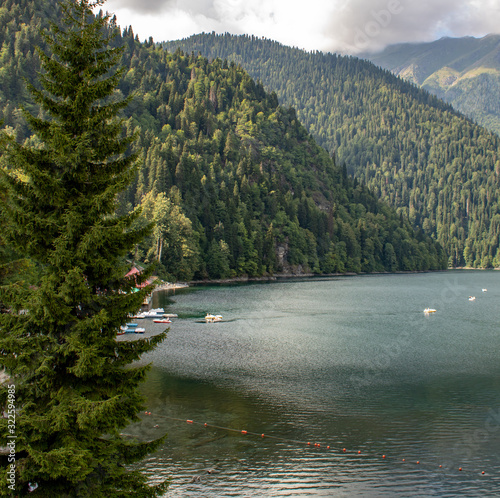 The most beautiful lake of the world Ritsa with the purest water located high in the mountains of Abkhazia photo