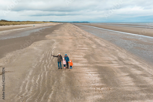 drone family portrait on beach