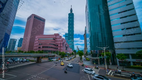 Taipei 101 tower with traffic on road in Taipei, Taiwan 