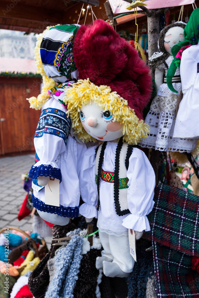 Dolls in traditional Romanian port exhibited at the Christmas fair in Bucharest.