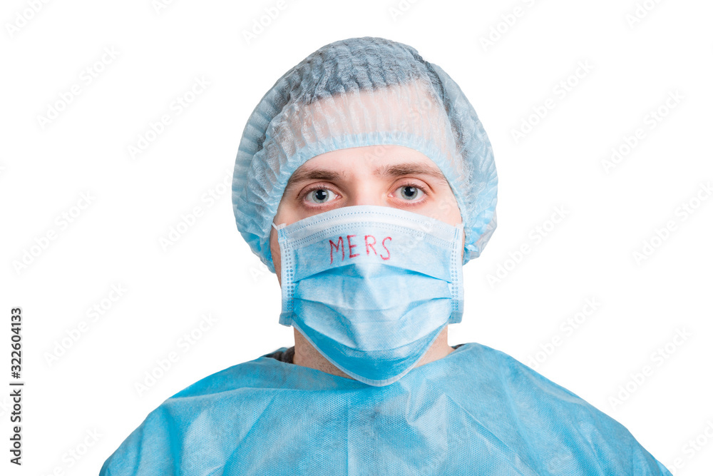 Portrait of ill man in medical unifrom and protective mask with MERS text isolated on white background. Respiratory protection. Coronavirus concept Portrait of ill man in medical unifrom and protective mask with MERS text isolated on white background. Respiratory protection. Coronavirus concept