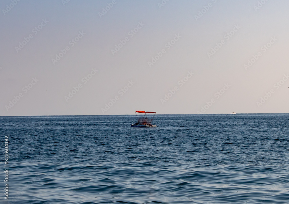 Black Sea of Sochi riding high-speed boats on a hot summer day
