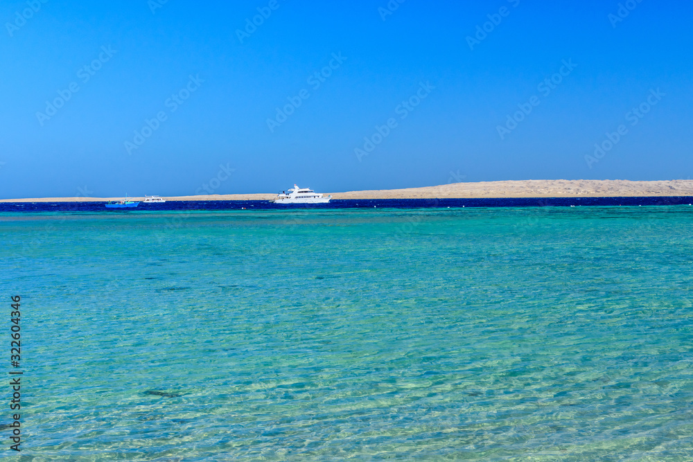 White yacht in Red sea not far from the Hurghada city, Egypt