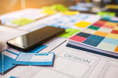 Website design team desk Design apps for mobile phones. UX UI design concept