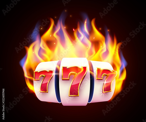 Burning slot machine wins wins the jackpot. Fire casino concept. Hot 777