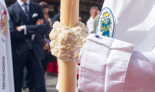 Detalle de un guante lleno de cera de un nazareno en Semana Santa photo
