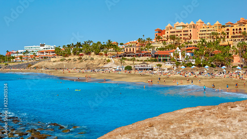 Landscape with blue sea and beach resort at summer vacation © EvgL