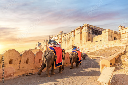 Tourists on the elephants in Amber Fort, Jaipur, Rajasthan, India photo