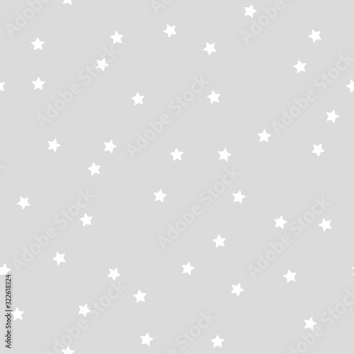 Vector seamless pattern with stars in a chaotic manner. Simple design for wrapping  wallpaper  textile