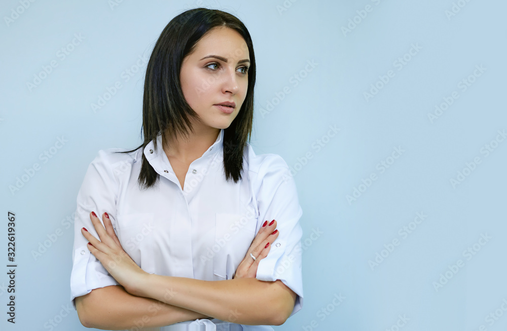 portraits of a woman of Caucasian appearance profession dentist with tools in hands on an isolated blue background, medicine concept portraits of a woman of Caucasian appearance profession dentist with tools in hands on an isolated blue background, medicine concept