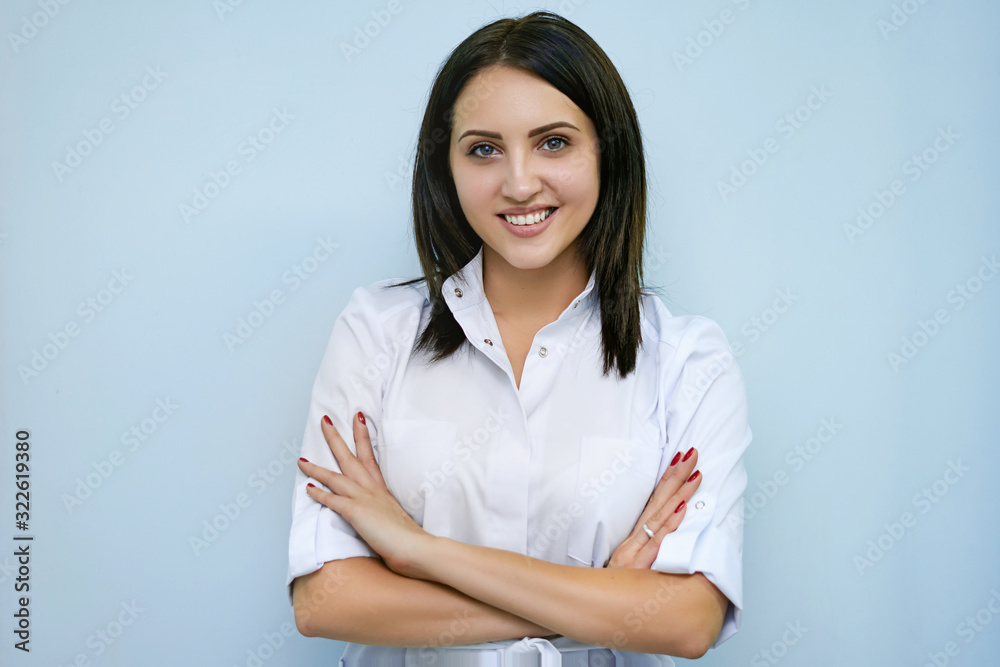 portraits of a woman of Caucasian appearance profession dentist with tools in hands on an isolated blue background, medicine concept portraits of a woman of Caucasian appearance profession dentist with tools in hands on an isolated blue background, medicine concept
