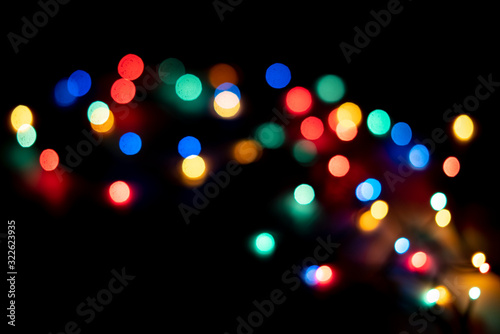 abstract colorful bokeh lights of garland on the party celebration