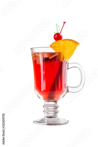 Winter hot drink mulled wine with spices, orange and cherry isolated on white background