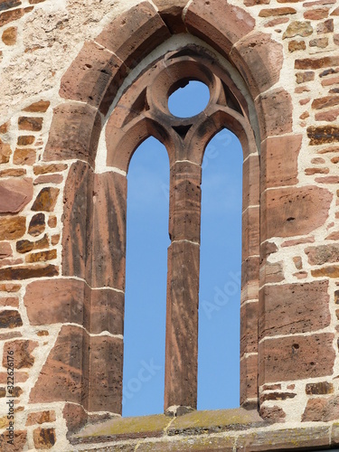 Fensteröffnung und Mauer der Totenkirche in Treysa photo