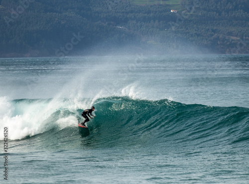 Photography surfing waves for fun