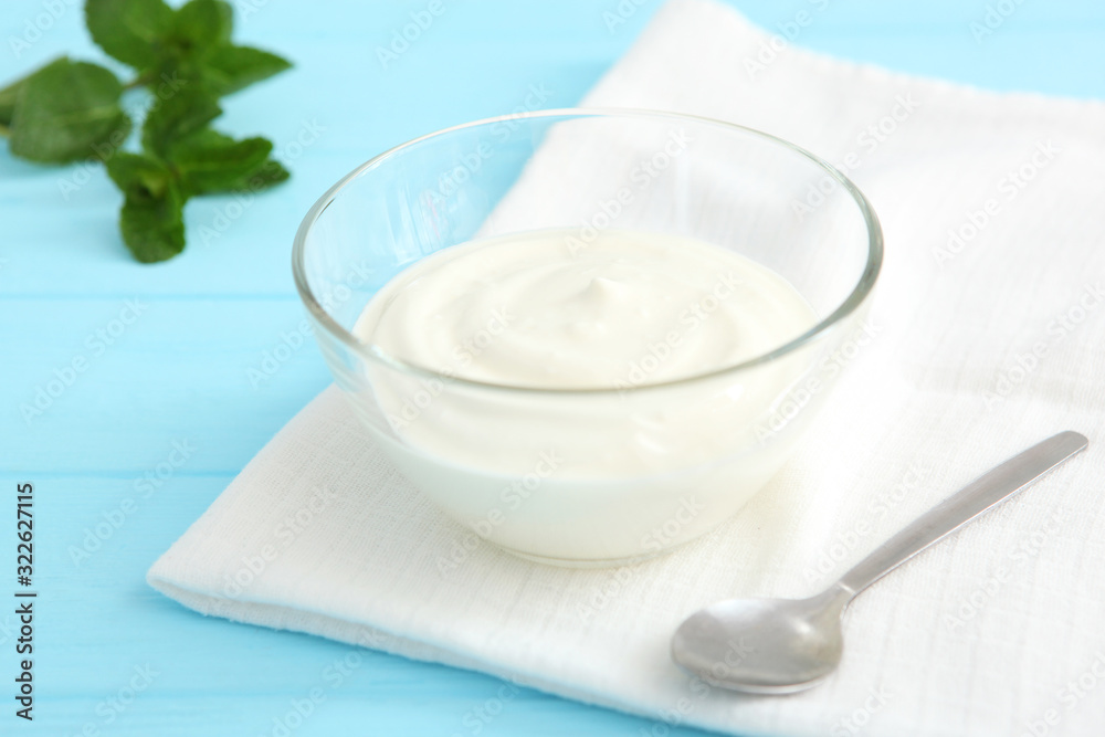 Natural white yogurt on the table. Healthy snack, Greek yogurt. Natural white yogurt on the table. Healthy snack, Greek yogurt.