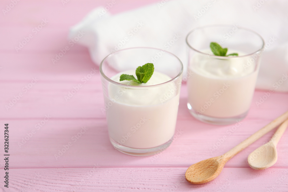 Natural white yogurt on the table. Healthy snack, Greek yogurt. Natural white yogurt on the table. Healthy snack, Greek yogurt.