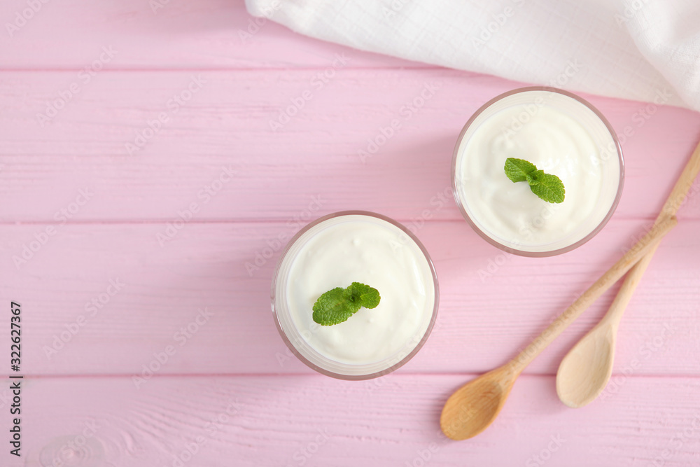Natural white yogurt on the table. Healthy snack, Greek yogurt. Natural white yogurt on the table. Healthy snack, Greek yogurt.