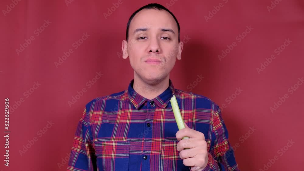 Man eat vegetables. Dieting Eating Disorders and weight loss concept. Man eat vegetables. Dieting Eating Disorders and weight loss concept.