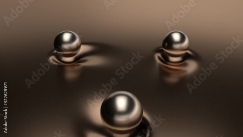 3D animation of an abstract background on which three spherical drops on a magnetic cushion slide along the surface of liquid bronze with highlights and artifacts and noise. The idea of an experiment 