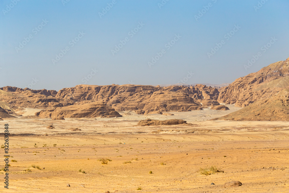 Egypt. Desert and mountains of the Sinai Peninsula. Sands, dunes, rocks and gorges. Promised land.