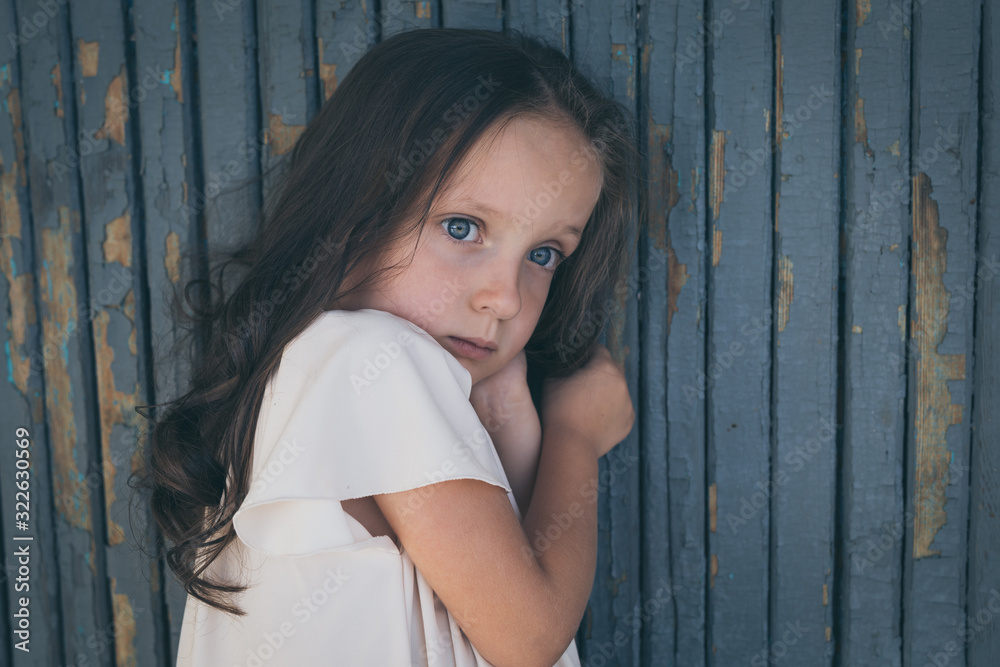 Fototapeta premium Portrait of sad little girl