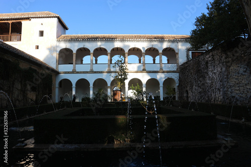 View from the beautiful patio to the Generalife palace in sunny winter morning