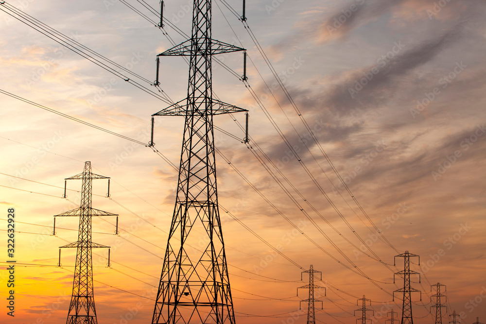Power lines and pylons at sunset in Billingham, Teeside, UK. Power lines and pylons at sunset in Billingham, Teeside, UK.